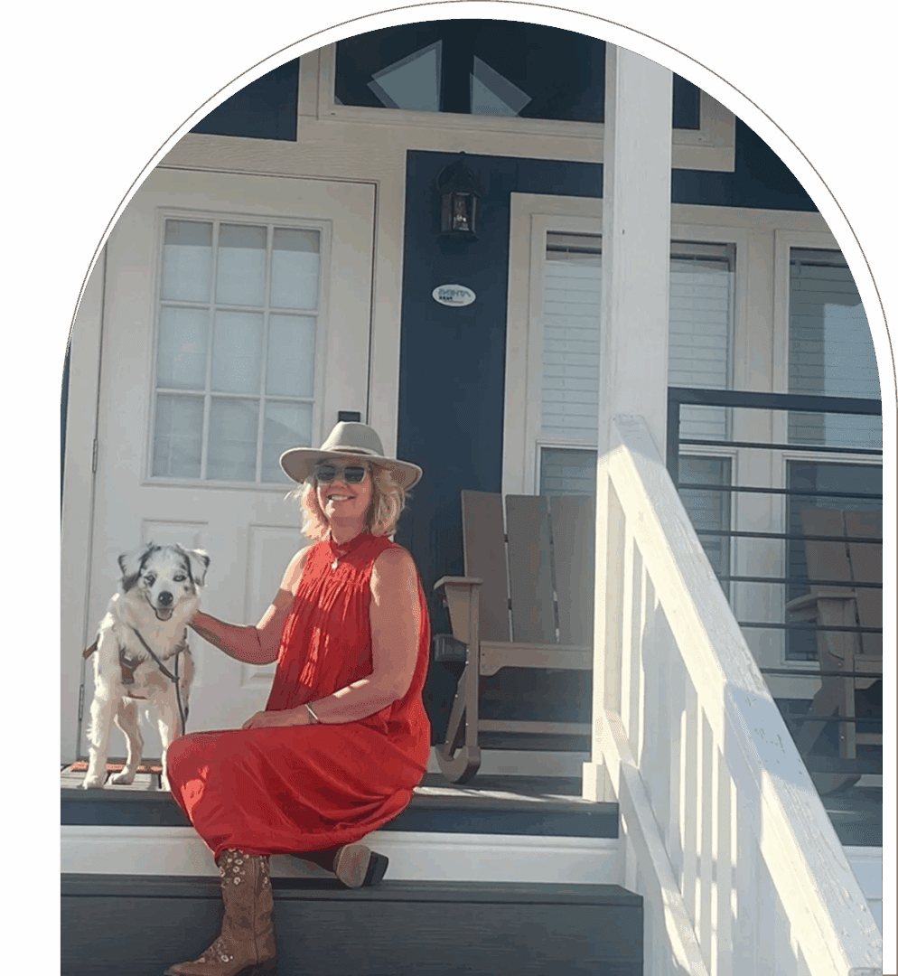 Lady and dog on porch steps